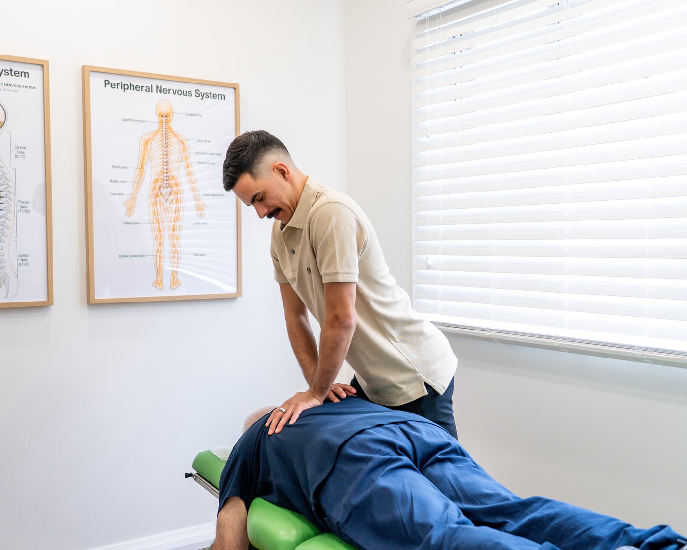 Alma Health chiropractor providing a chiropractic adjustment