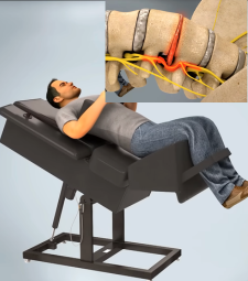 Patient receiving non-surgical spinal decompression treatment with an anatomical disc illustration